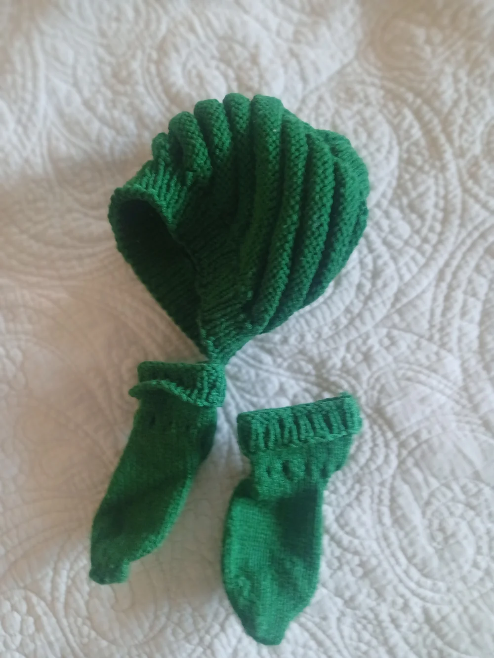 Various handknit toddler winter wear